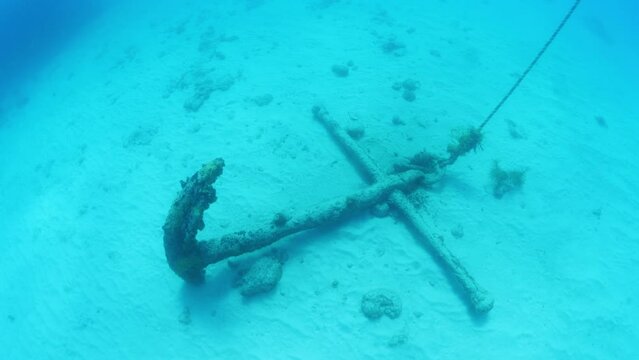 Underwater view of anchor on ocean floor / Bridgetown, Barbados