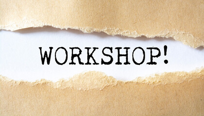 Workshop Message written under torn paper.