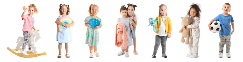 Group of cute children with toys on white background