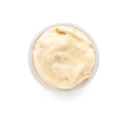 Caesar salad dressing in bowl on white background