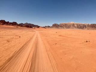 Fototapeta na wymiar Wadi Rum, Jordan, November 2019 - A desert on a dirt road
