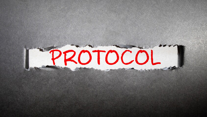 PROTOCOL word written on wood block. PROTOCOL text on wooden table for your desing, concept.