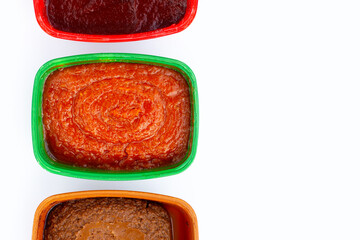 Korean chili paste on white background.