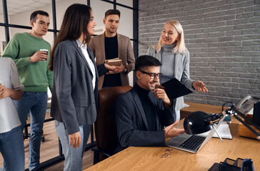 Co-workers having business meeting in office