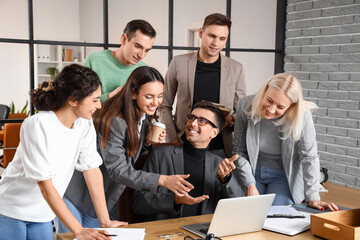 Co-workers having business meeting in office