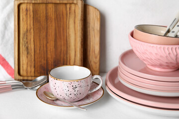Fototapeta premium Set of different dishware and kitchenware on white table