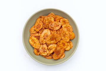 Banana chips on white background