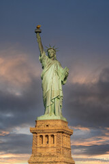 Fototapeta premium Statue of Liberty against the backdrop of storm clouds as a symbol of bringing freedom
