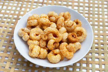 Crispy pork rinds or pork snack.