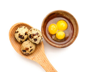 Whole and cracked raw quail eggs on white background, closeup