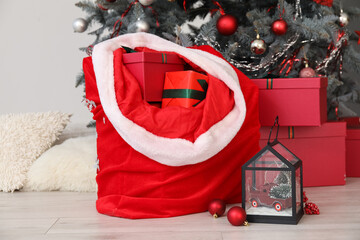Santa bag with gifts in room
