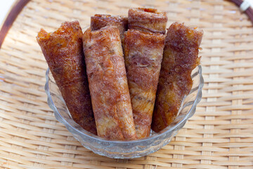 Sun dried banana roll snacks