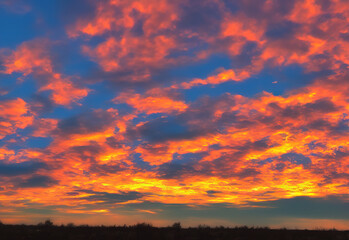 Fototapeta na wymiar Beautiful sunset sky background with bold colors 