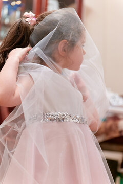 Beutiful Young Girl Playing With A Gauze Formal Dress