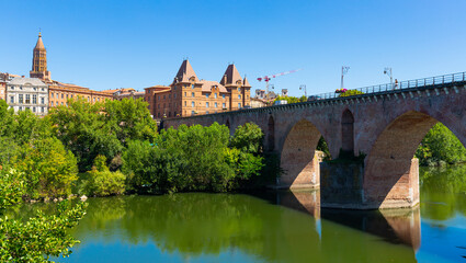 Fototapeta na wymiar Montauban with bridge and river Tarn in Tarn-et-Garonne department, Occitanie region in southern France
