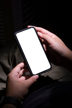 Hands holding smart phone with  empty screen. Close up view, Blank screen for your advertise texe.