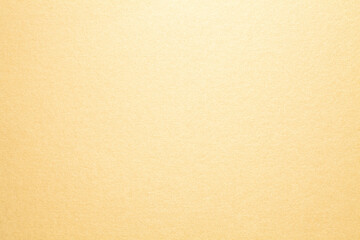 Sheet of golden paper texture background
