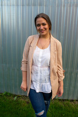 young beautiful woman in a jacket and jeans