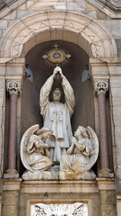 Fototapeta na wymiar Statue on the Basilica of the Blessed Sacrament in Buenos Aires, Argentina