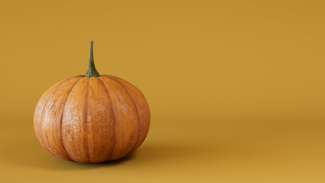Pumpkin on a Mustard Yellow colored background. Autumn themed Wallpaper with copy-space.