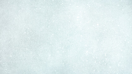 christmas background. festive silver and white glitter texture.