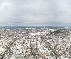 City panorama from the height of the drone flight. Residential area of brick houses in the winter. Aerial view. Nizhny Tagil, Russia