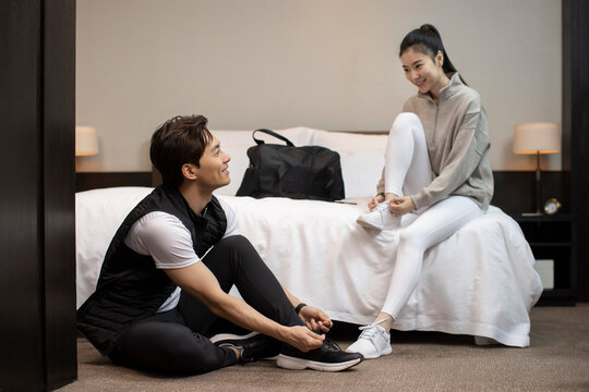 Young couple getting ready to go out and workout