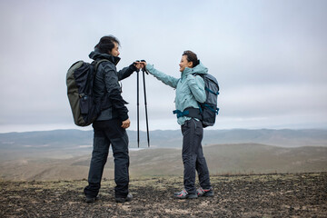Happy couple hiking outdoors