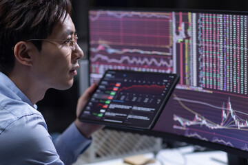 Businessman working in office at night
