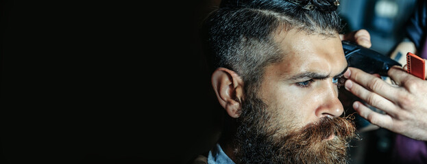 Fototapeta premium Beard man with classic long beardin barbershop. Shaving in barber shop. Mustache men. Templates web banner design. Horizontal banner for website header with text copy space.