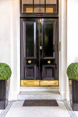 Black front door, white exterior 