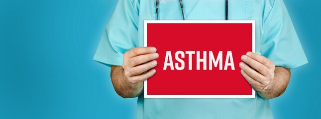 Asthma. Doctor shows red sign with medical word on it. Blue background.