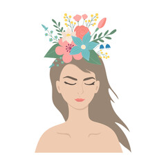 Beautiful young woman with closed eyes and flowers on her head