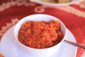 chili sauce (sambal) in a white bowl