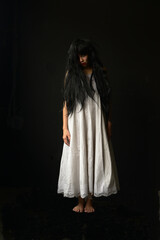 Happy Halloween day in Scary ghost woman. Asian ghost or zombie horror creepy scary have hair...