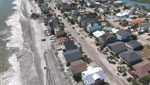 Clean Up After Hurricane Ian Storm Surge Causes Beach Erosion And Damages Property At Surfside Garden City Along Coastal South Carolina