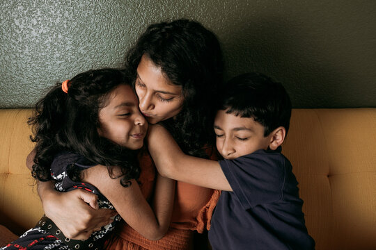 Siblings hugging each other