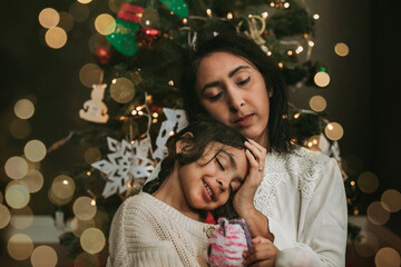 Mom with her kid during Christmas