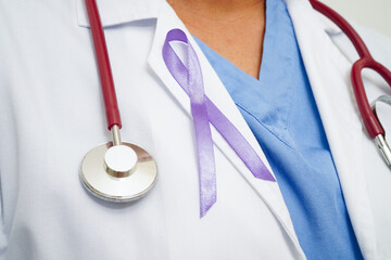 Asian woman doctor with purple ribbon, World Pancreatic Cancer day or World Alzheimer day.