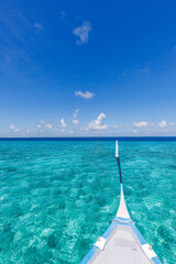 Fototapeta premium Amazing view from boat over clear sea water lagoon. Luxury travel, tropical blue turquoise Mediterranean panoramic seascape luxury white sailboat yacht. Beautiful exotic summer vacation leisure cruise