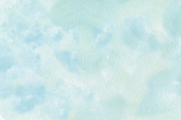 Abstract watercolor background. Delicate shades of green and blue on watercolor paper. Picturesque spots of paint.