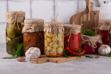 Pickled vegetables in glass jars.