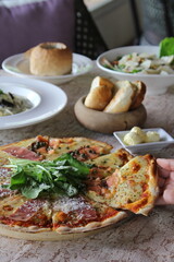 thin slices of pizza on the table