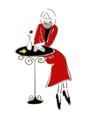 Woman in red coat relaxing in a café.