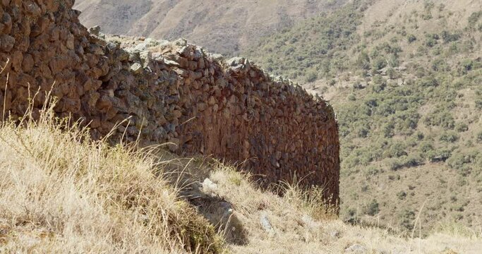 Pumamarka inca stone wall and grass - 4k