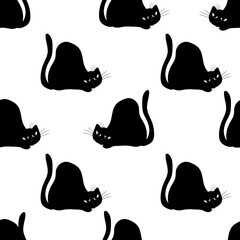 Black cats. Seamless backgrounds  of black silhouette of kitten.