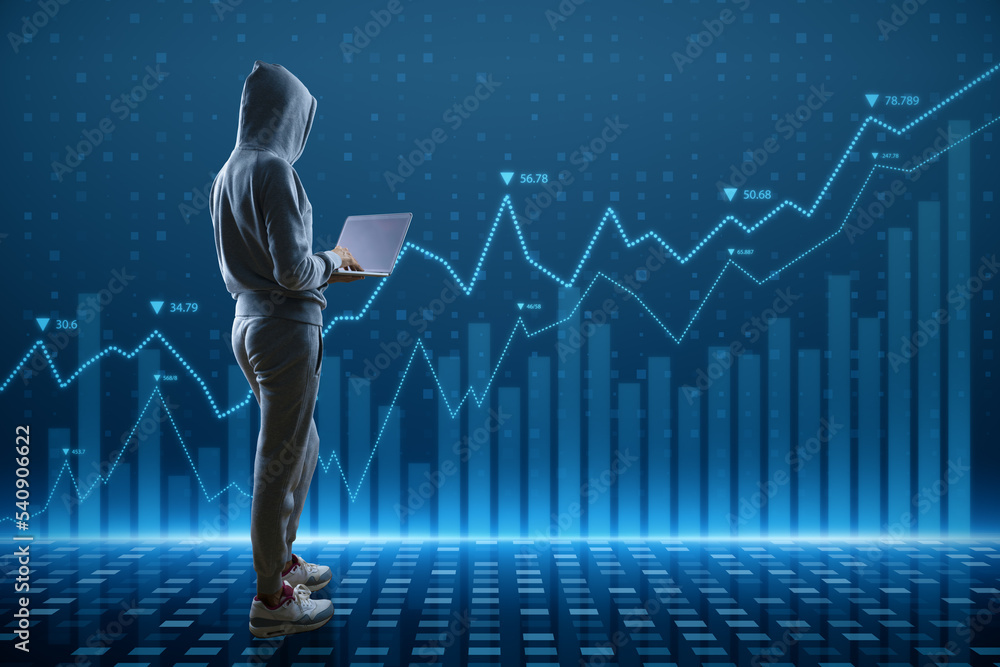 Leinwandbilder Hacker with laptop computer using abstract glowing blue business graph hologram on blurry background. Economy, finance, hacking, data theft and digital money concept.