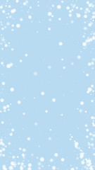 Beautiful snowfall christmas background. Subtle flying snow flakes and stars on light blue winter backdrop. Beautiful snowfall overlay template. Vertical vector illustration.