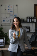 Beautiful asian businesswoman working in office. business finance concept