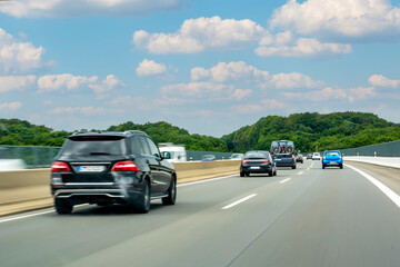 Obraz na płótnie Canvas Car on highway in summer